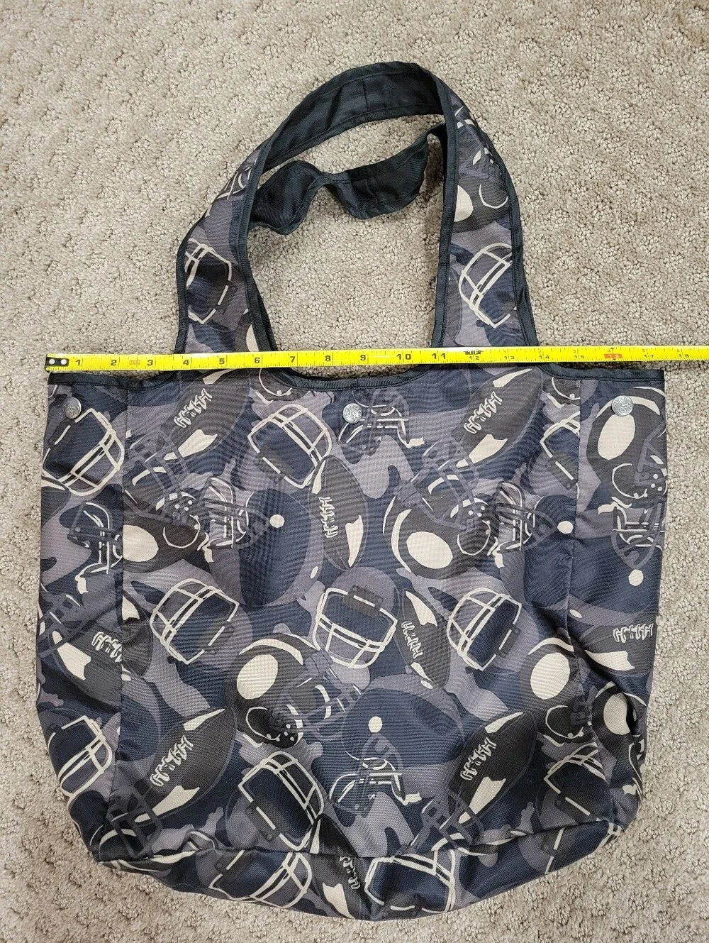 Double handle bag, snap closure, flat bottom, football pattern, like new